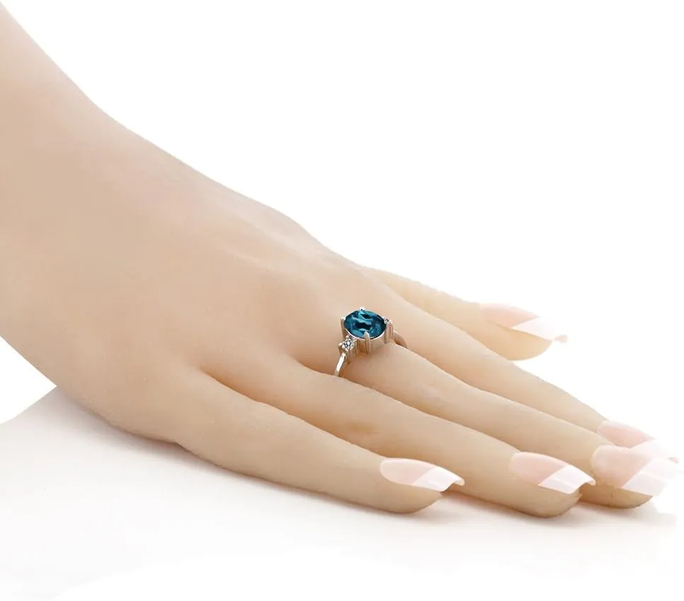 Gem Stone King 925 Sterling Silver Oval London Blue Topaz and White Diamond Ring For Women (1.93 Cttw, Gemstone Birthstone, Available In Size 5, 6, 7, 8, 9)